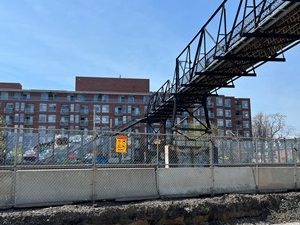 TWR 300x300 Chain link fence installed next to jersey barriers